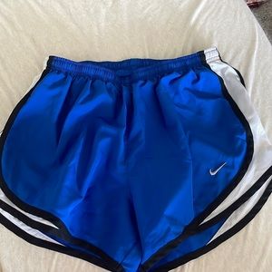Blue nike running shorts